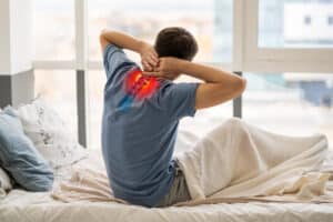 Man with cervical spondylosis neck pain.